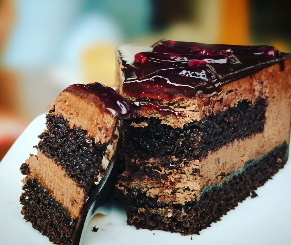 A slice of rich chocolate cake